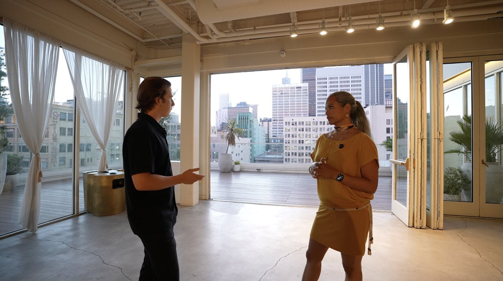 Yewan Fitz-Earle with Farah Casis on a venue tour at Savanna Rooftop