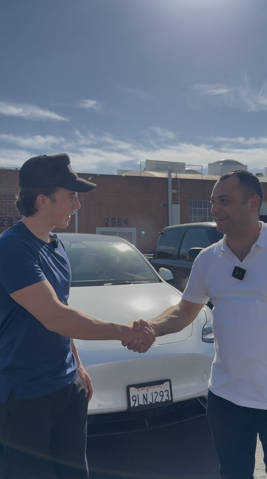 Yewan Fitz-Earle shaking hands with Arthur, co-owner of Palladio