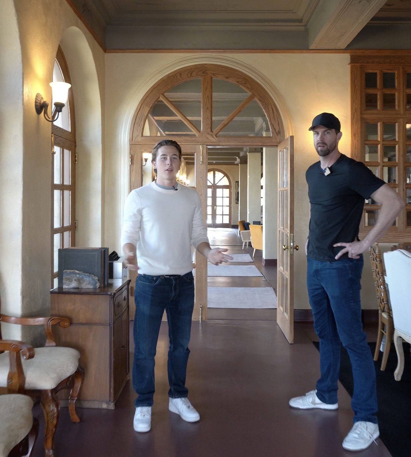 Yewan Fitz-Earle with Brian Grooms in an arched hallway inside The Little Daisy